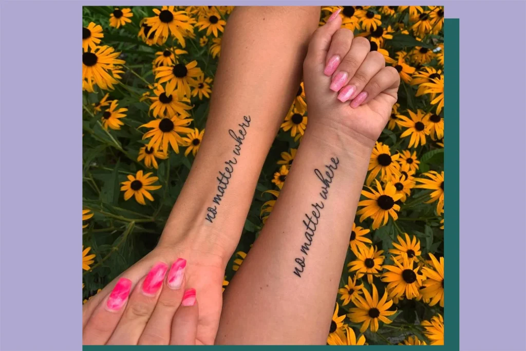 Silhouette Hugging Couple Tattoo