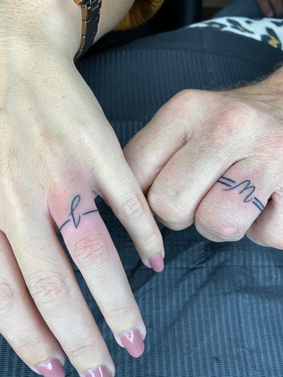 Couple Finger Tattoo with Secret Symbols