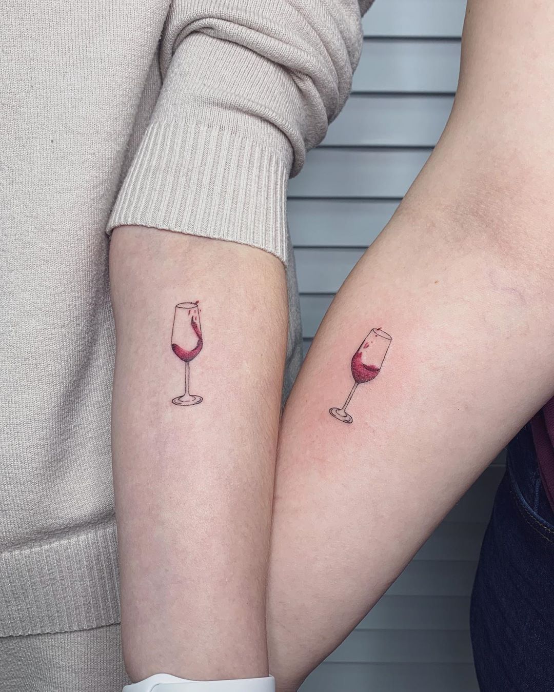 Intertwined Hands Line Tattoo